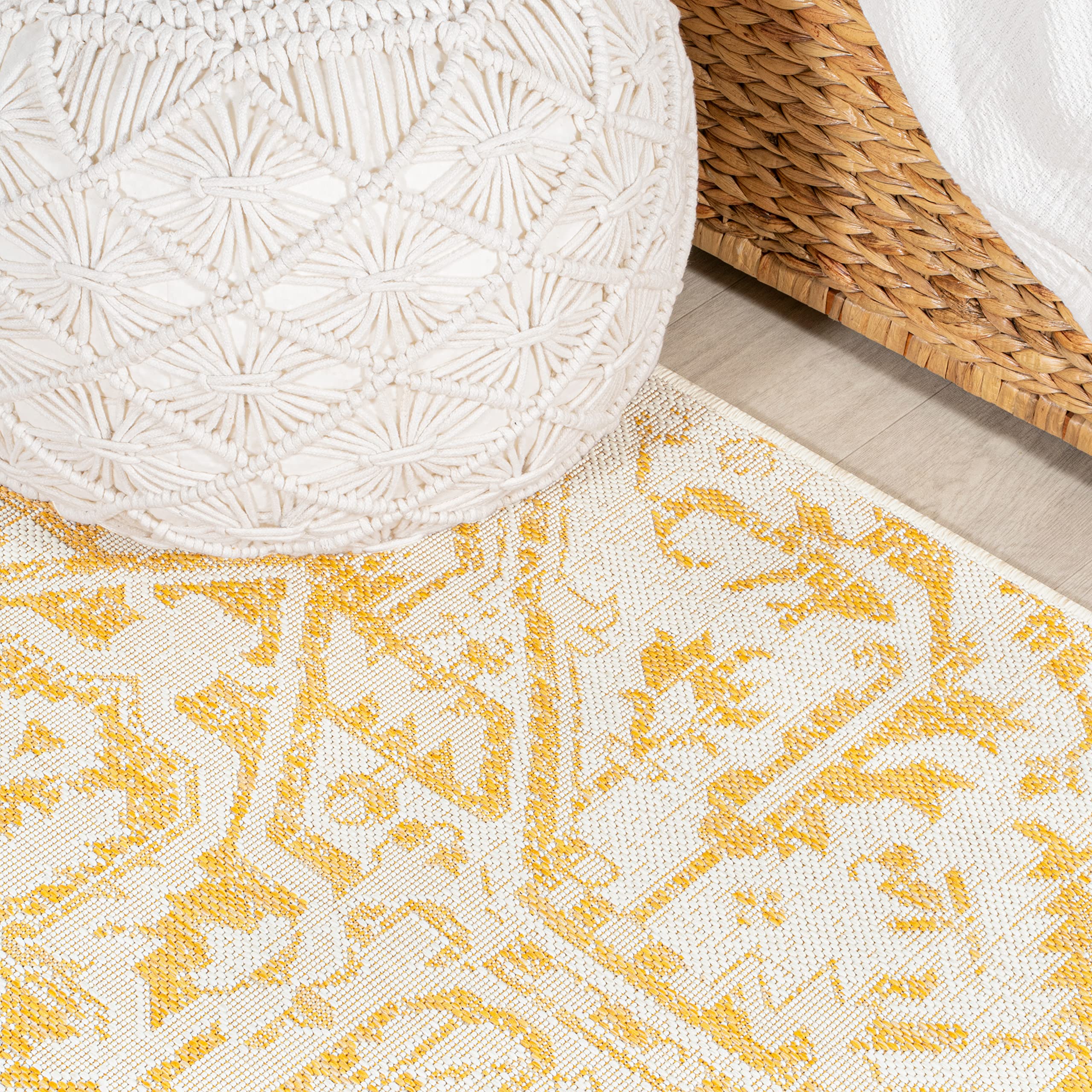 JONATHAN Y Boho Medallion Area Rug rolled up for storage