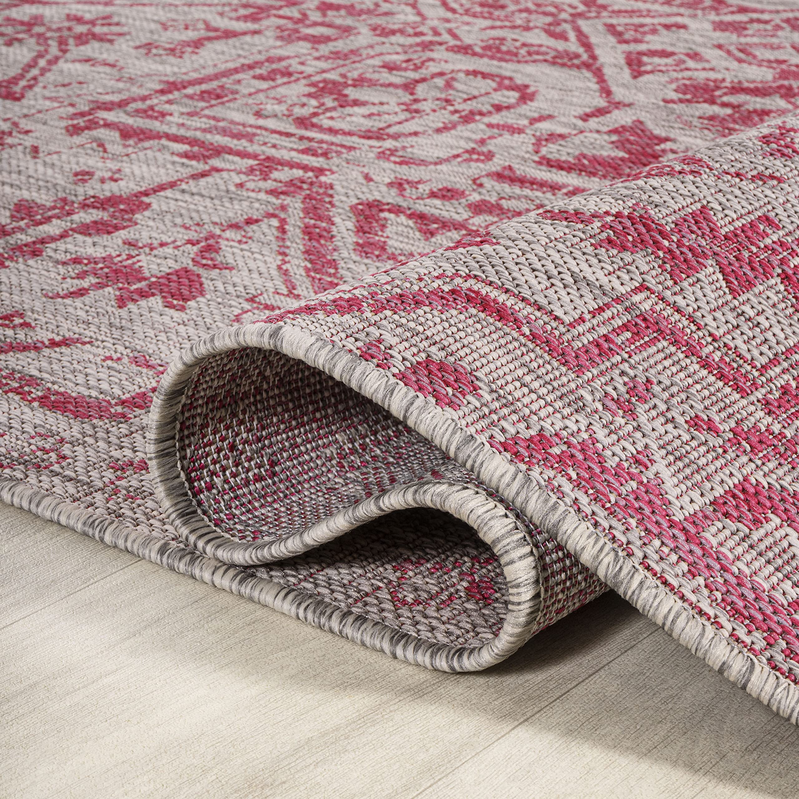 JONATHAN Y Boho Medallion Area Rug showing its light gray and fuchsia colours