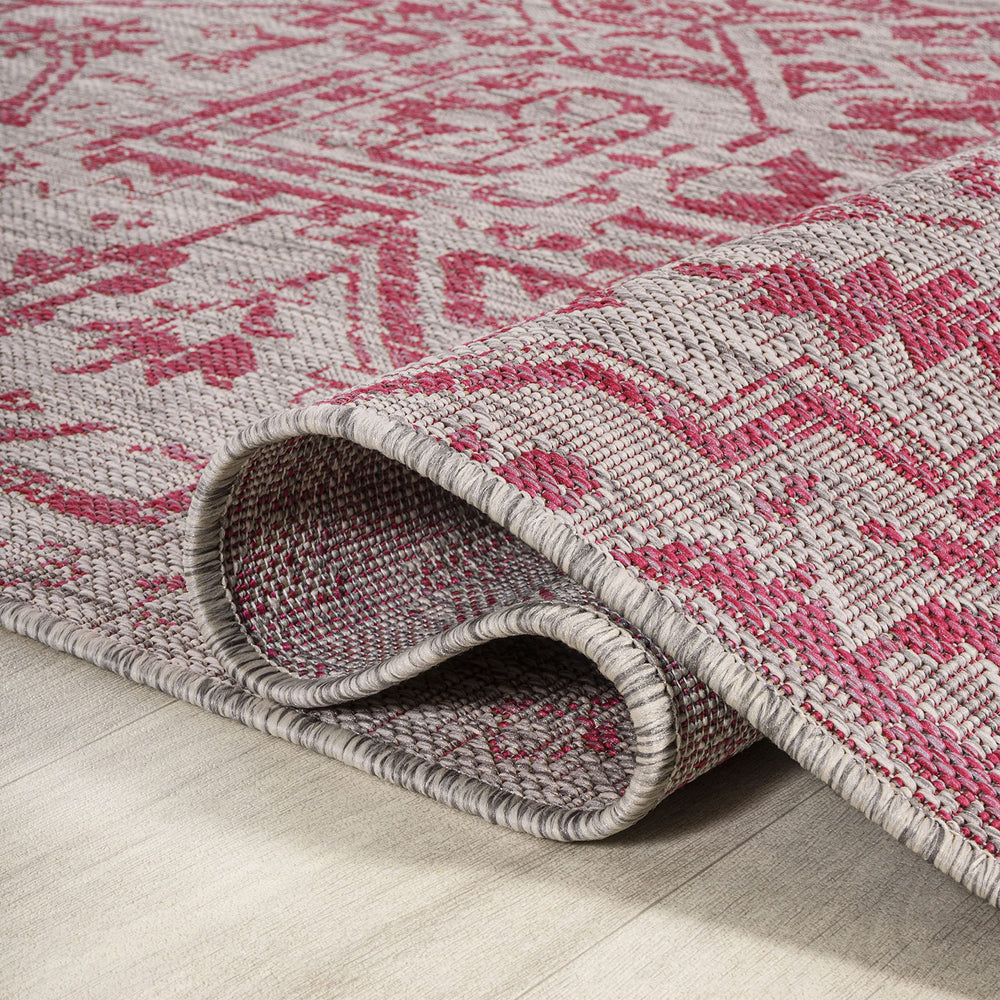 JONATHAN Y Boho Medallion Area Rug showing its light gray and fuchsia colours