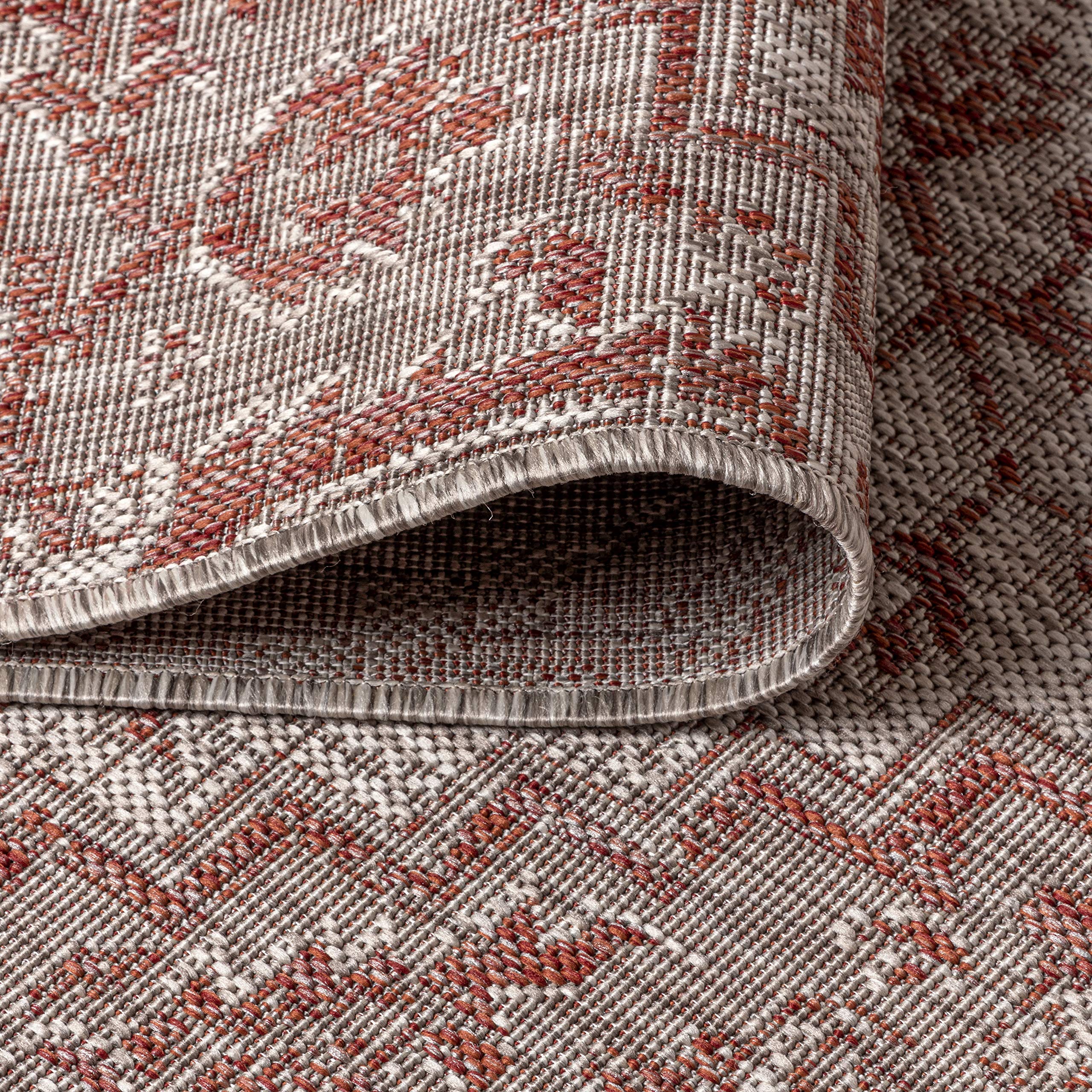 JONATHAN Y Boho Medallion Round Area Rug in outdoor patio setting