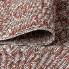 JONATHAN Y Boho Medallion Round Area Rug in outdoor patio setting