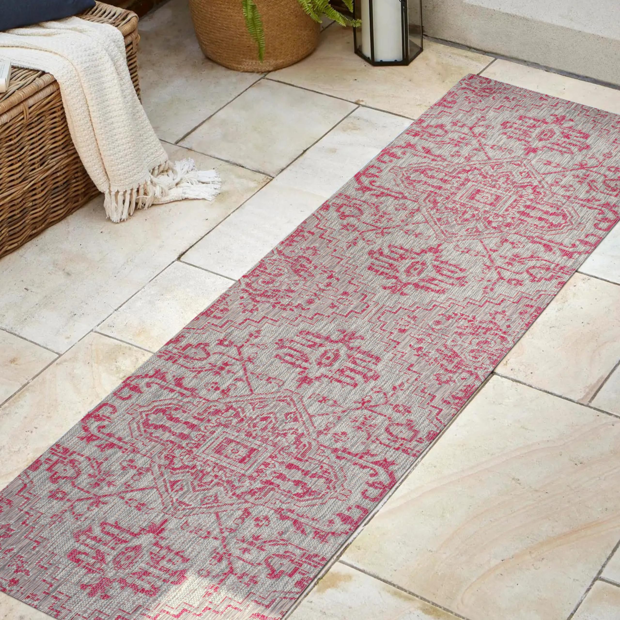 JONATHAN Y Boho Medallion Runner Rug displayed on a patio