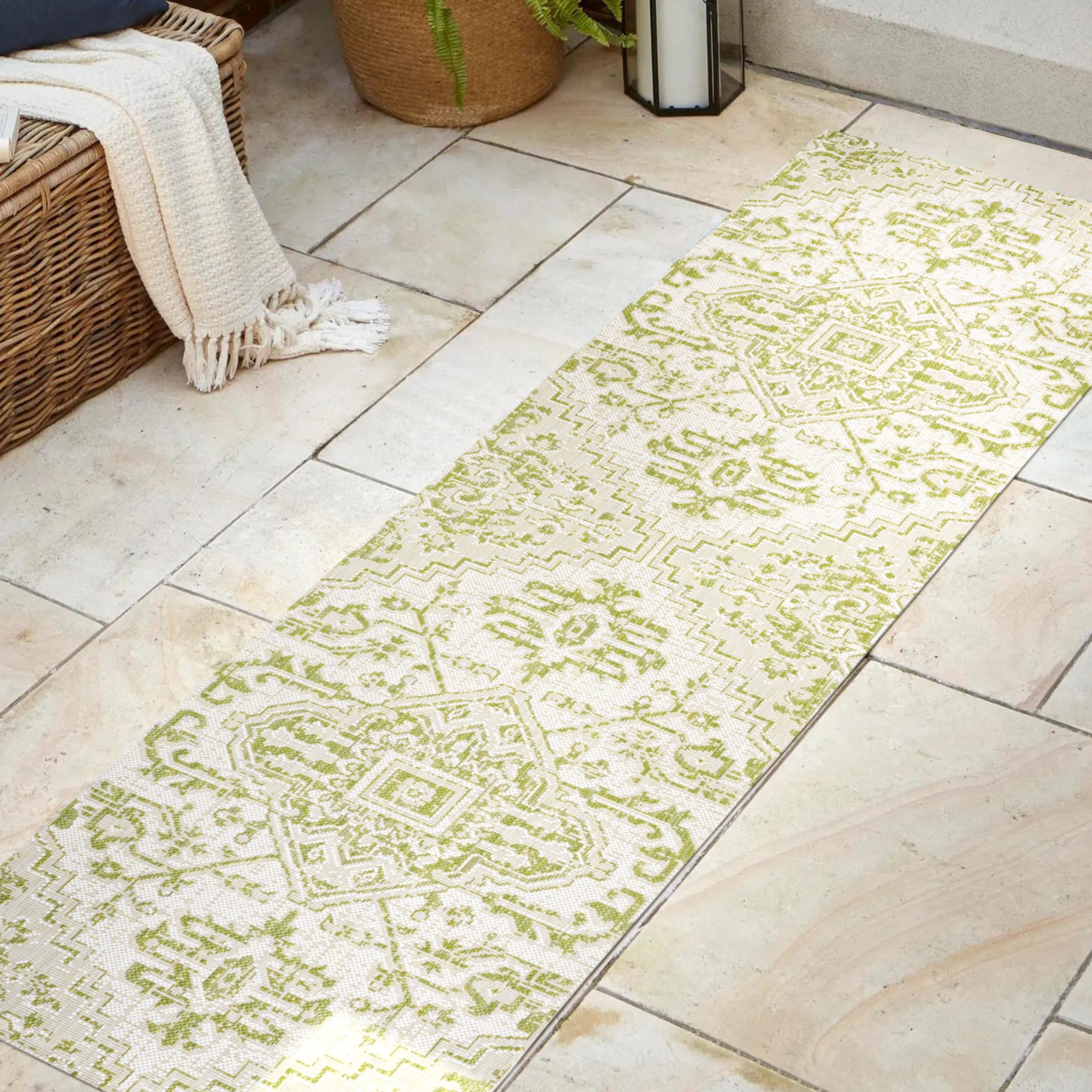 JONATHAN Y Boho Medallion Runner Rug in outdoor patio setting