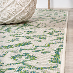 JONATHAN Y Boho Medallion Runner Rug rolled up for storage