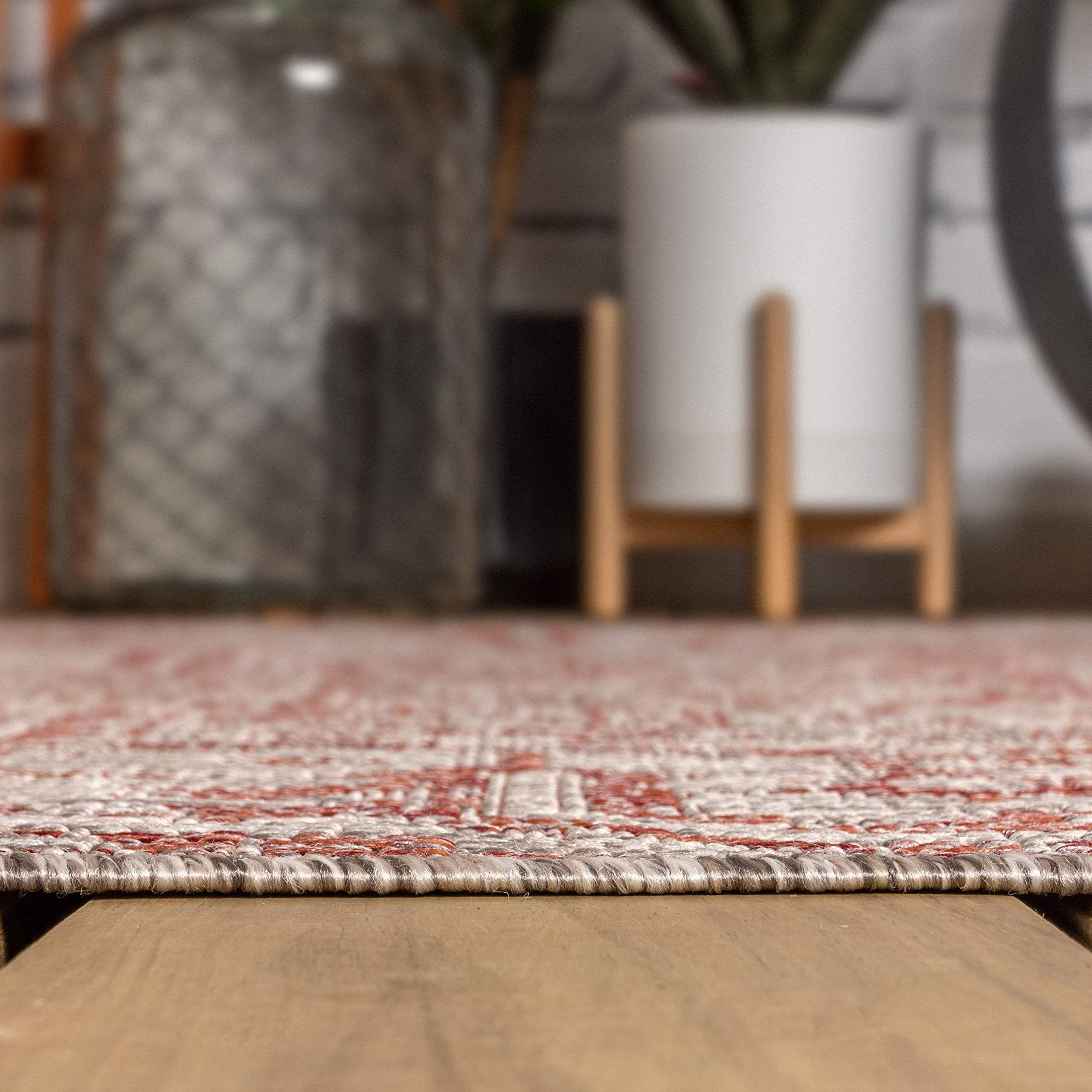 JONATHAN Y Boho Medallion Runner Rug rolled up for storage