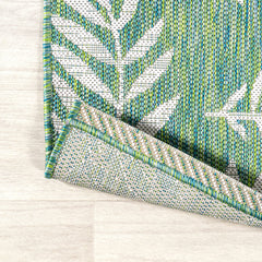 JONATHAN Y Palm Frond Area Rug in living room