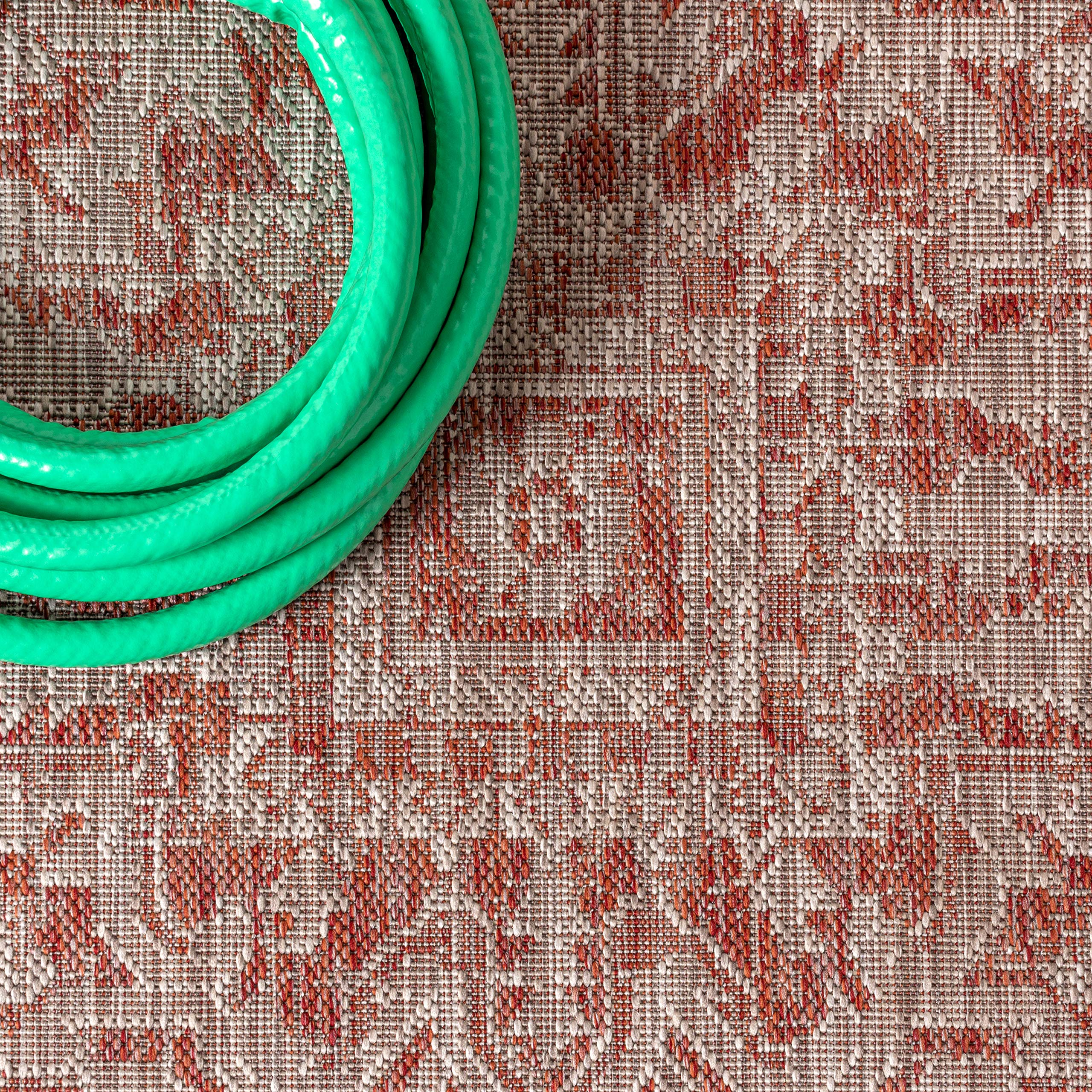 JONATHAN Y rug displayed on a patio