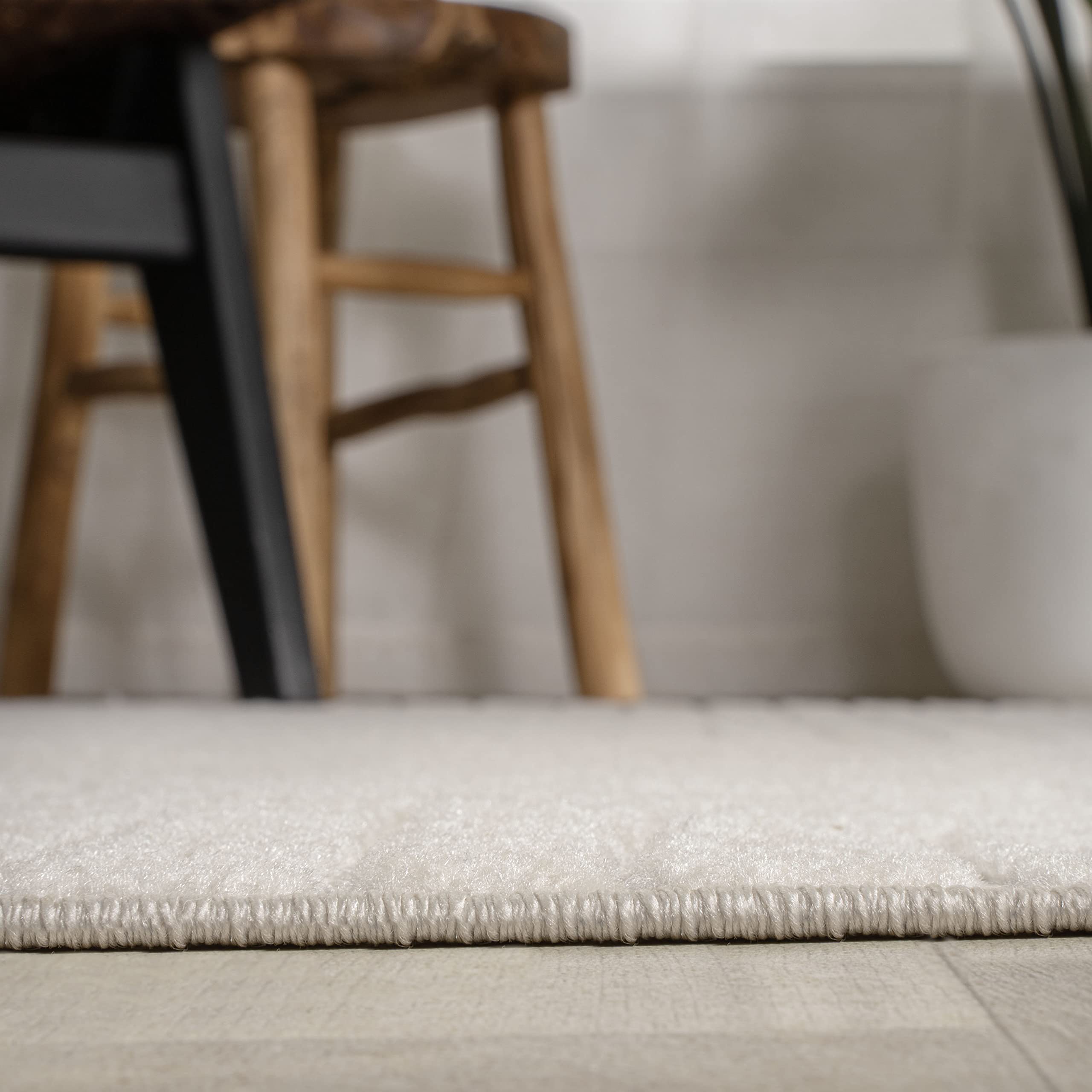 JONATHAN Y runner rug in a cozy living room environment