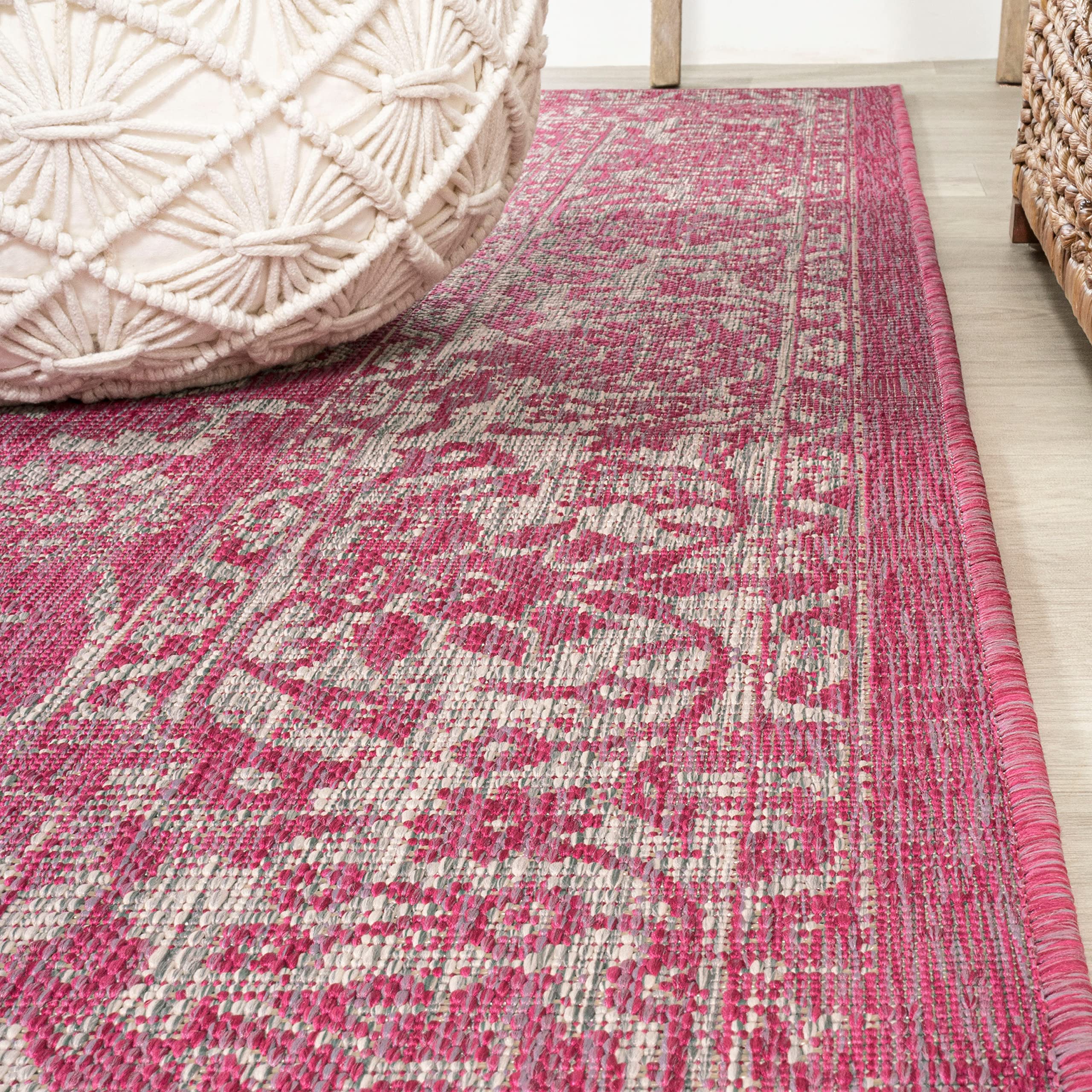 JONATHAN Y Weave Floral Area Rug displayed in a living room