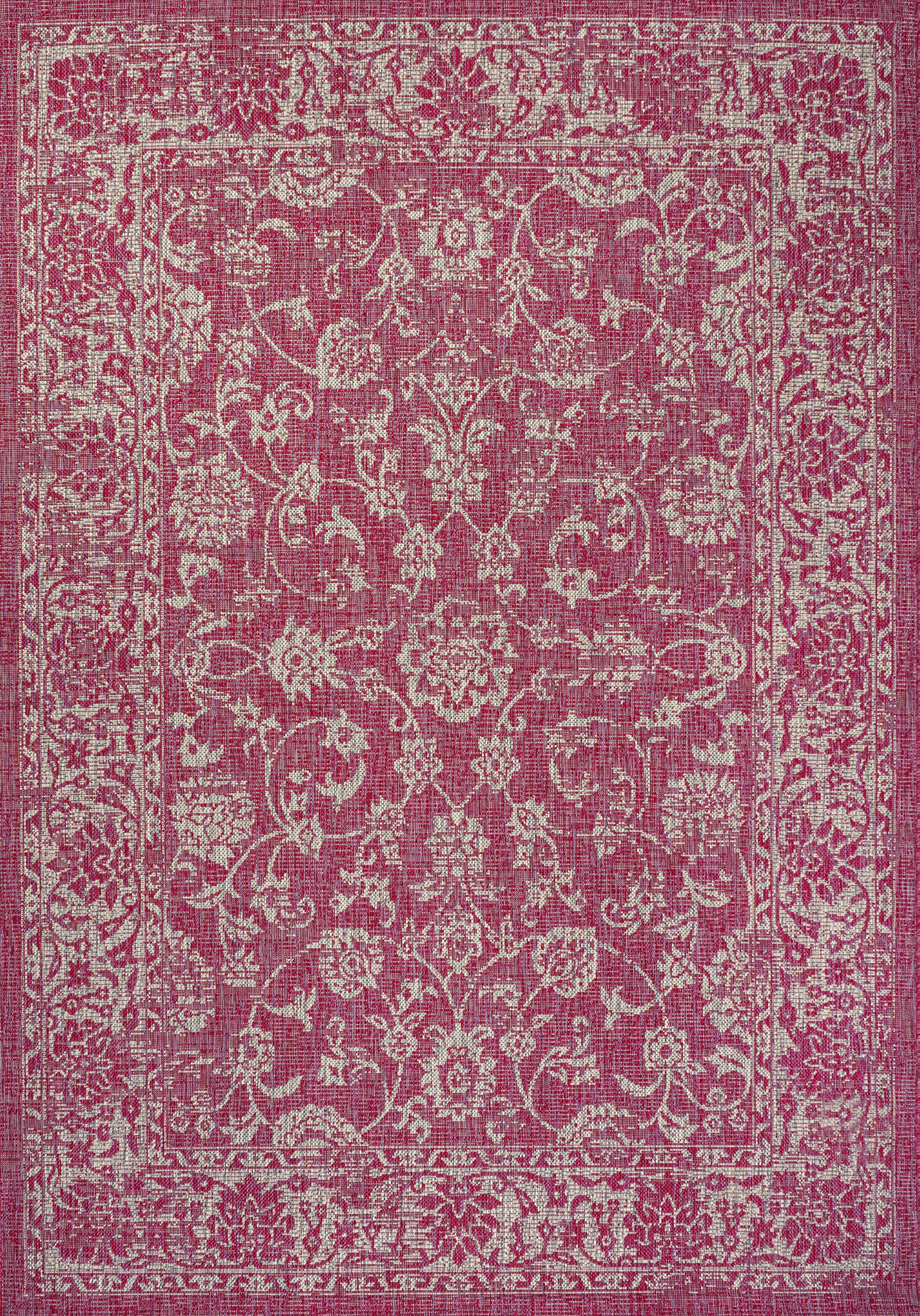 JONATHAN Y Weave Floral Area Rug in a garden setting