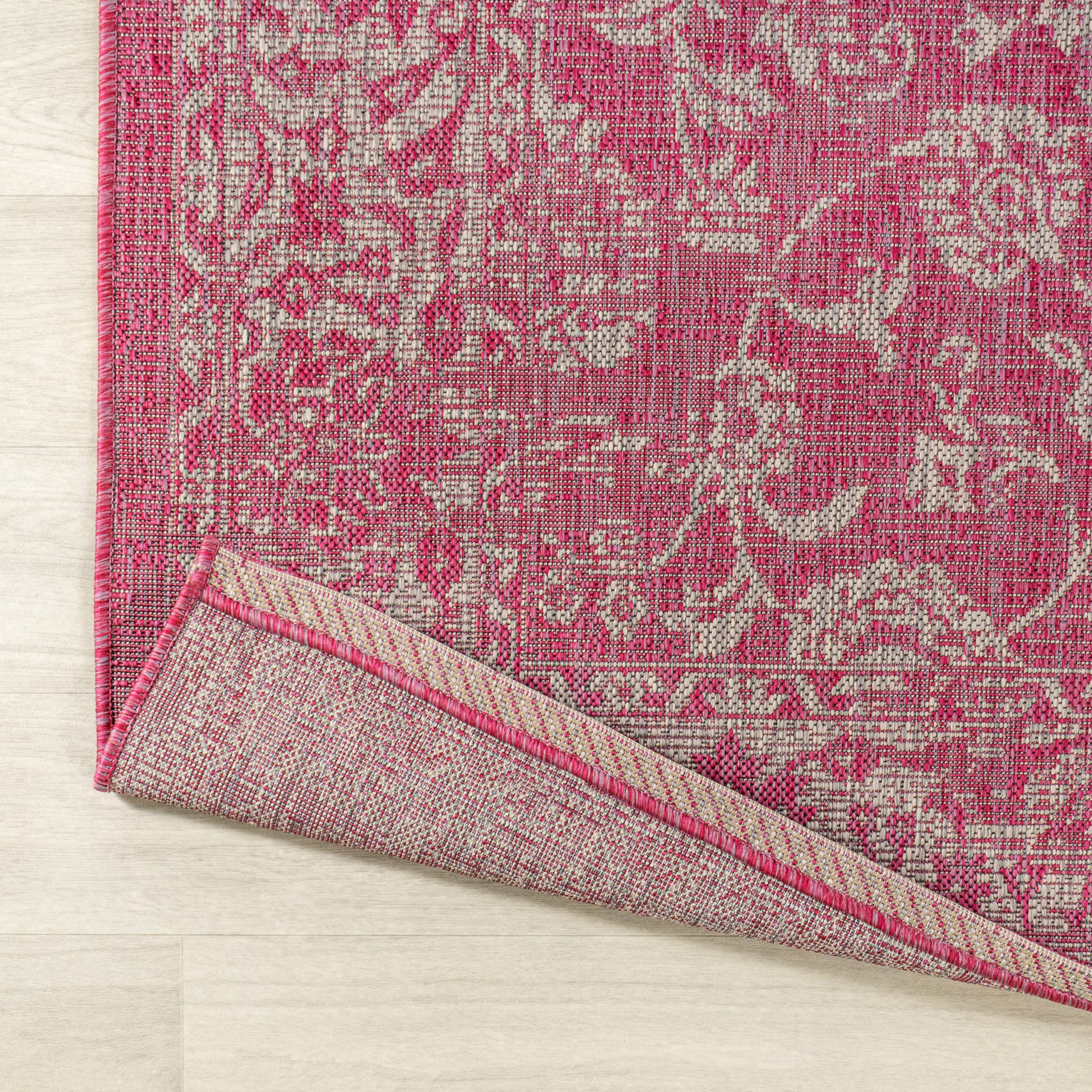 JONATHAN Y Weave Floral Area Rug showing fuchsia and light gray pattern