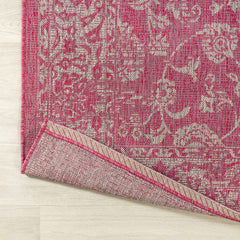 JONATHAN Y Weave Floral Area Rug showing fuchsia and light gray pattern