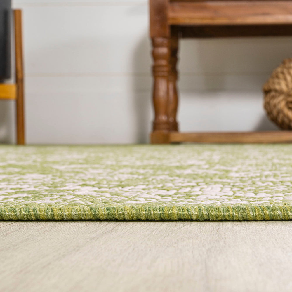 JONATHAN Y Weave Floral Runner Rug in a living space