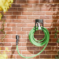 Josmimic garden hose holder installed with extension cords attached