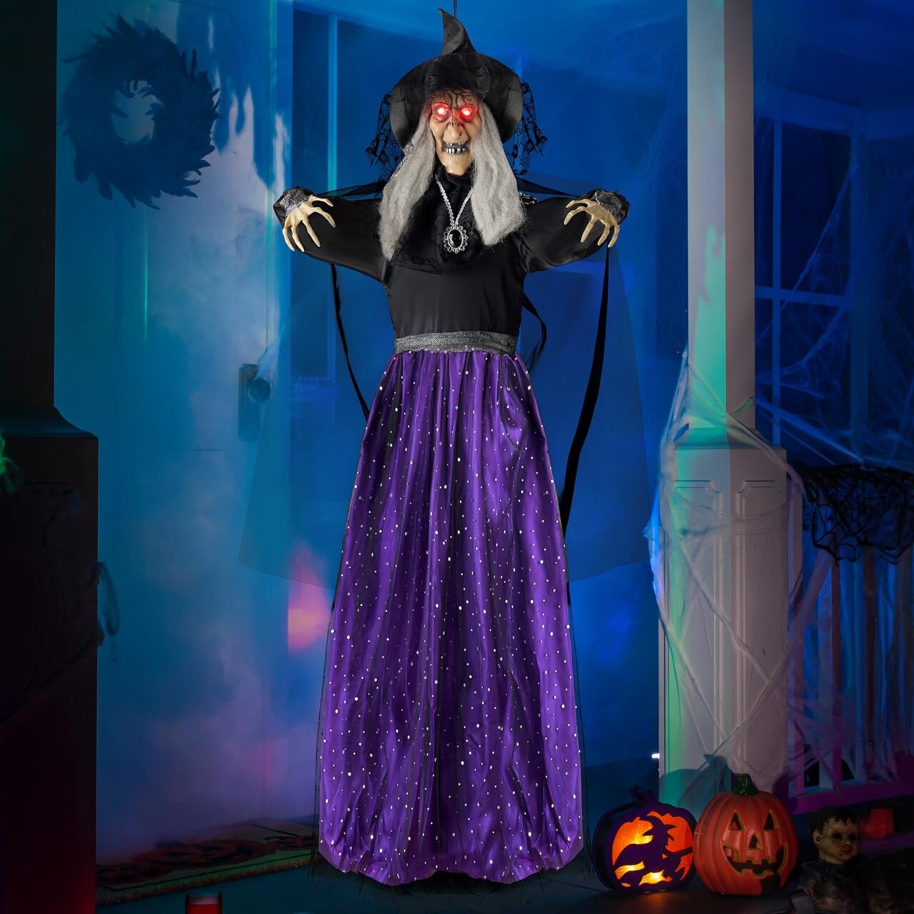 JOYIN 47-inch animated witch decoration with LED eyes