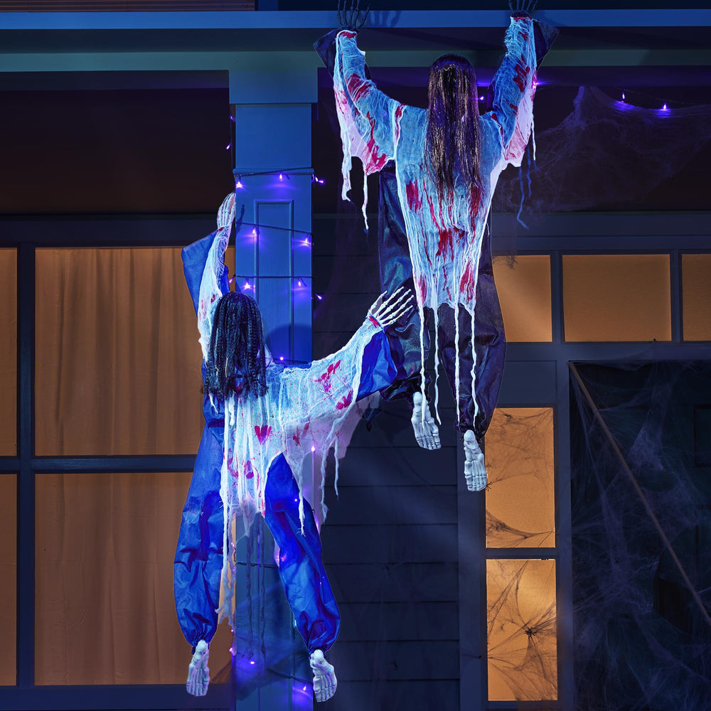 JOYIN Halloween Climbing Zombie Wall Decoration hanging on a wall
