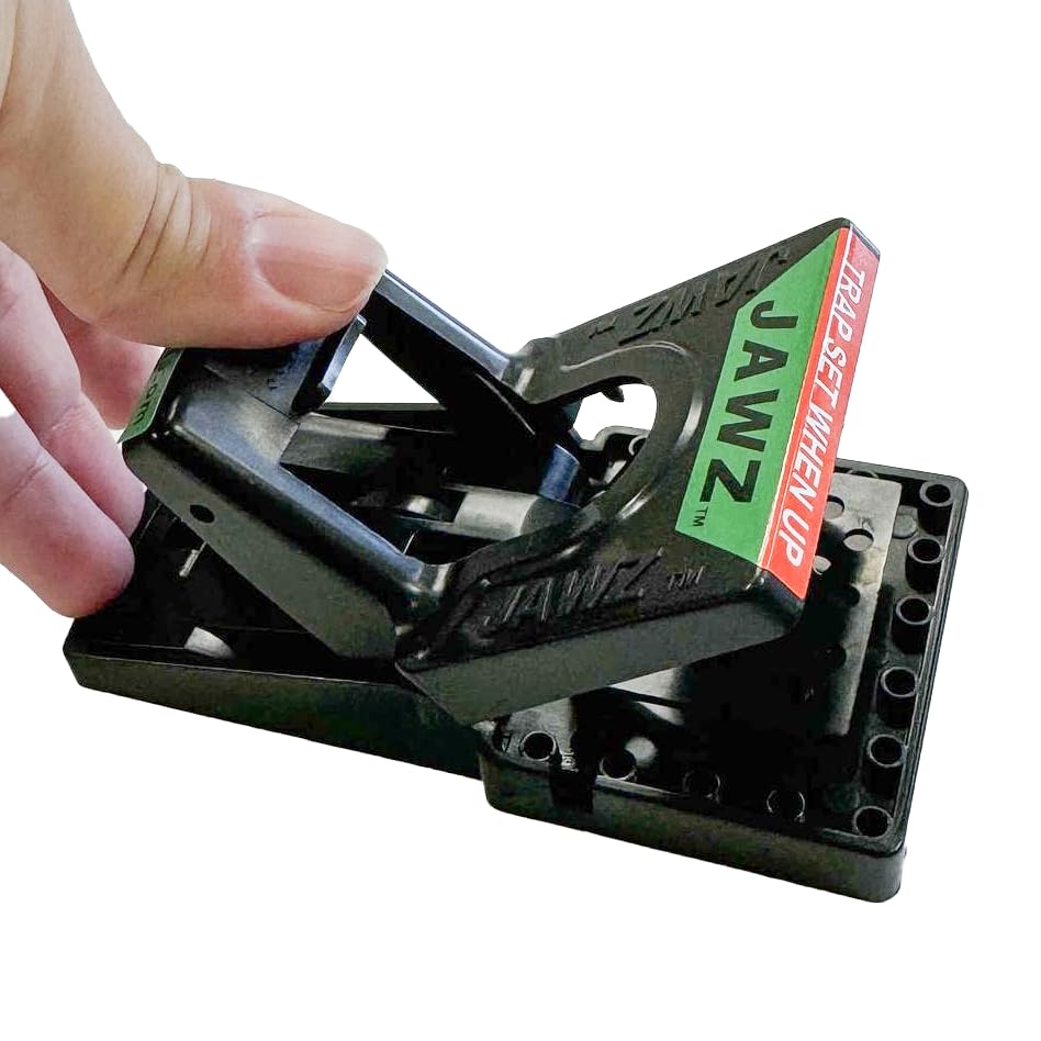 JT Eaton Mouse Trap set in a cabinet for pest control