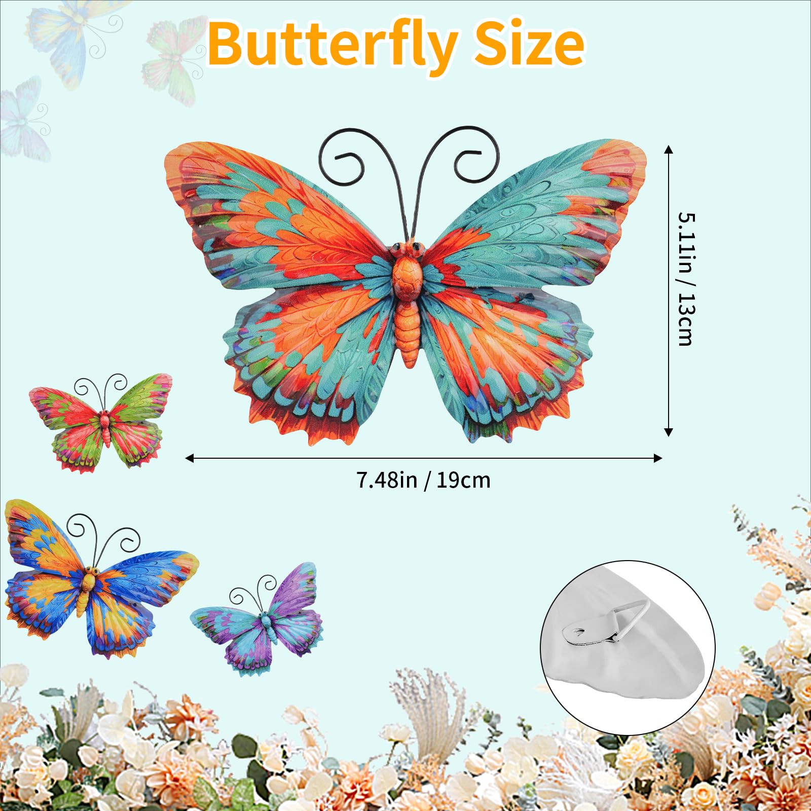 Junware butterfly wall art hanging on a garden fence