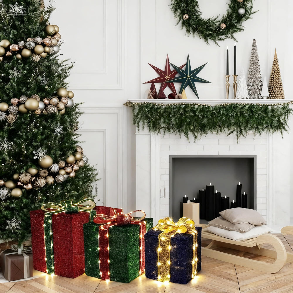 Jyoiat lighted gift boxes in winter setting