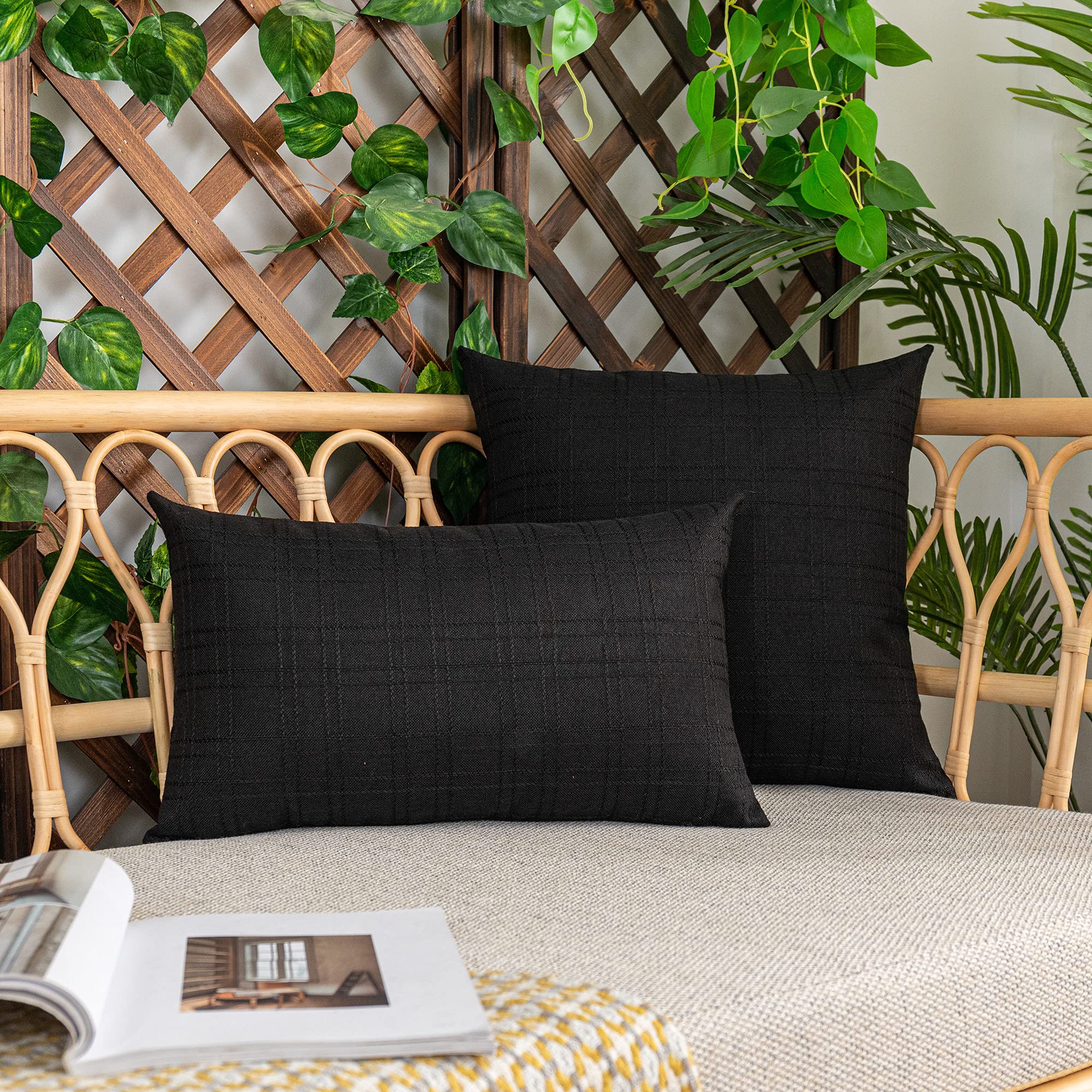 K KEVIN TEXTILE Outdoor Pillow Cover demonstrating waterproof feature