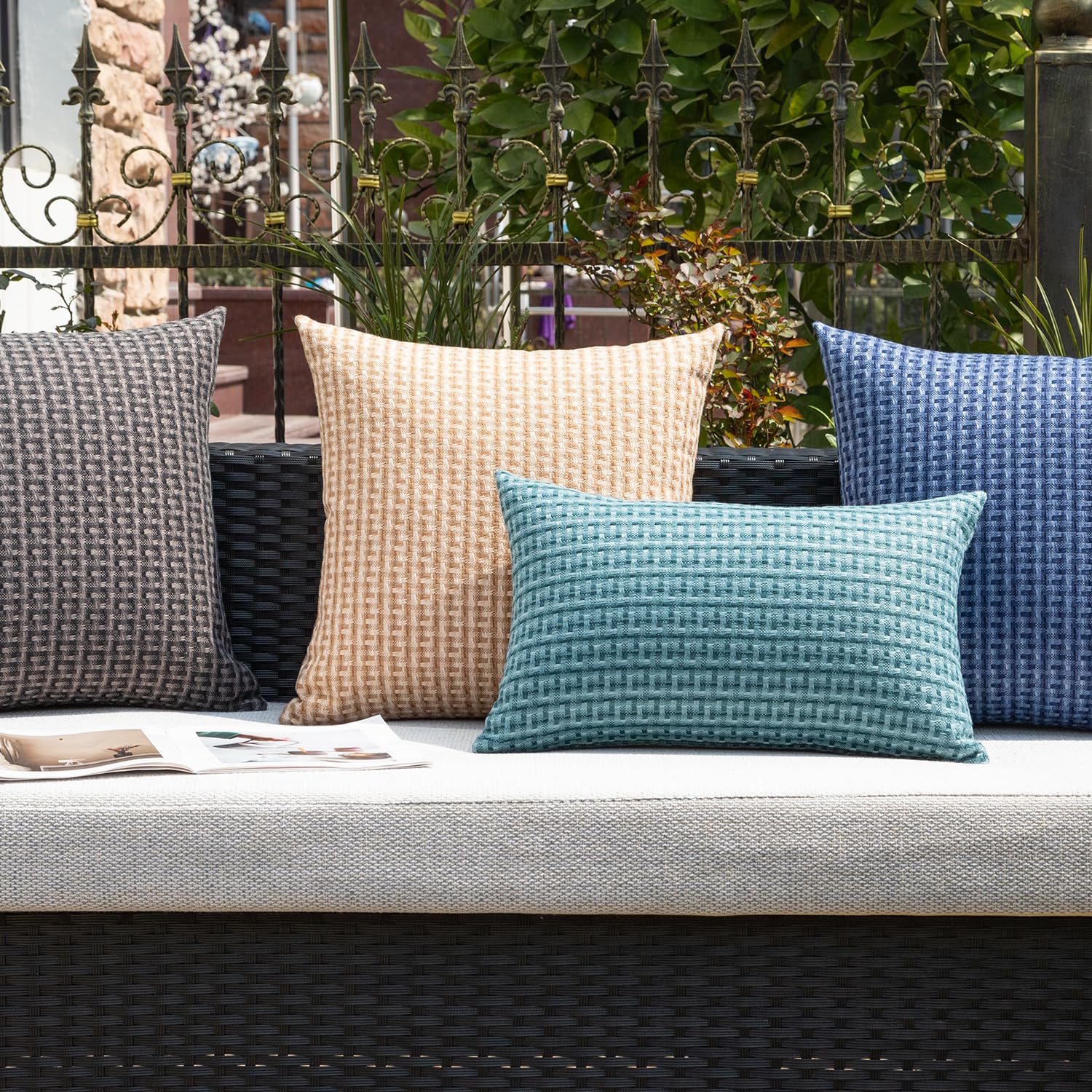 K KEVIN TEXTILE teal pillow cover on patio sofa