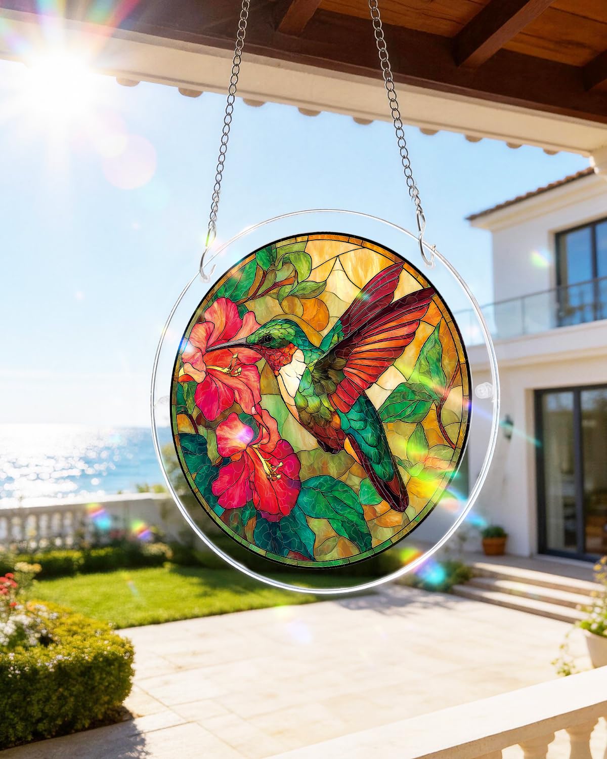 KaayeeWood Suncatcher hanging in sunlight casting colourful shadows