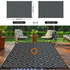Kalafun Outdoor Patio Rug 6x9 ft on a patio setting