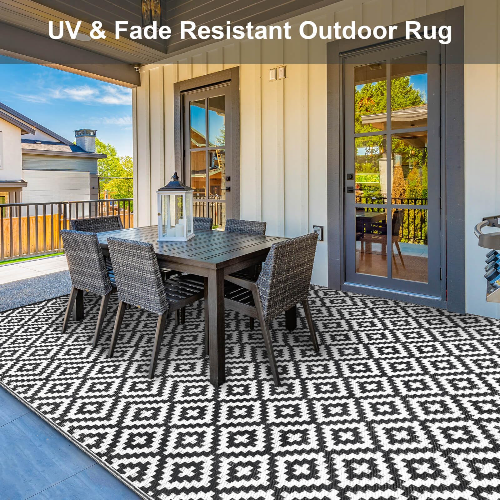Kalafun Outdoor Patio Rug being cleaned with a hose