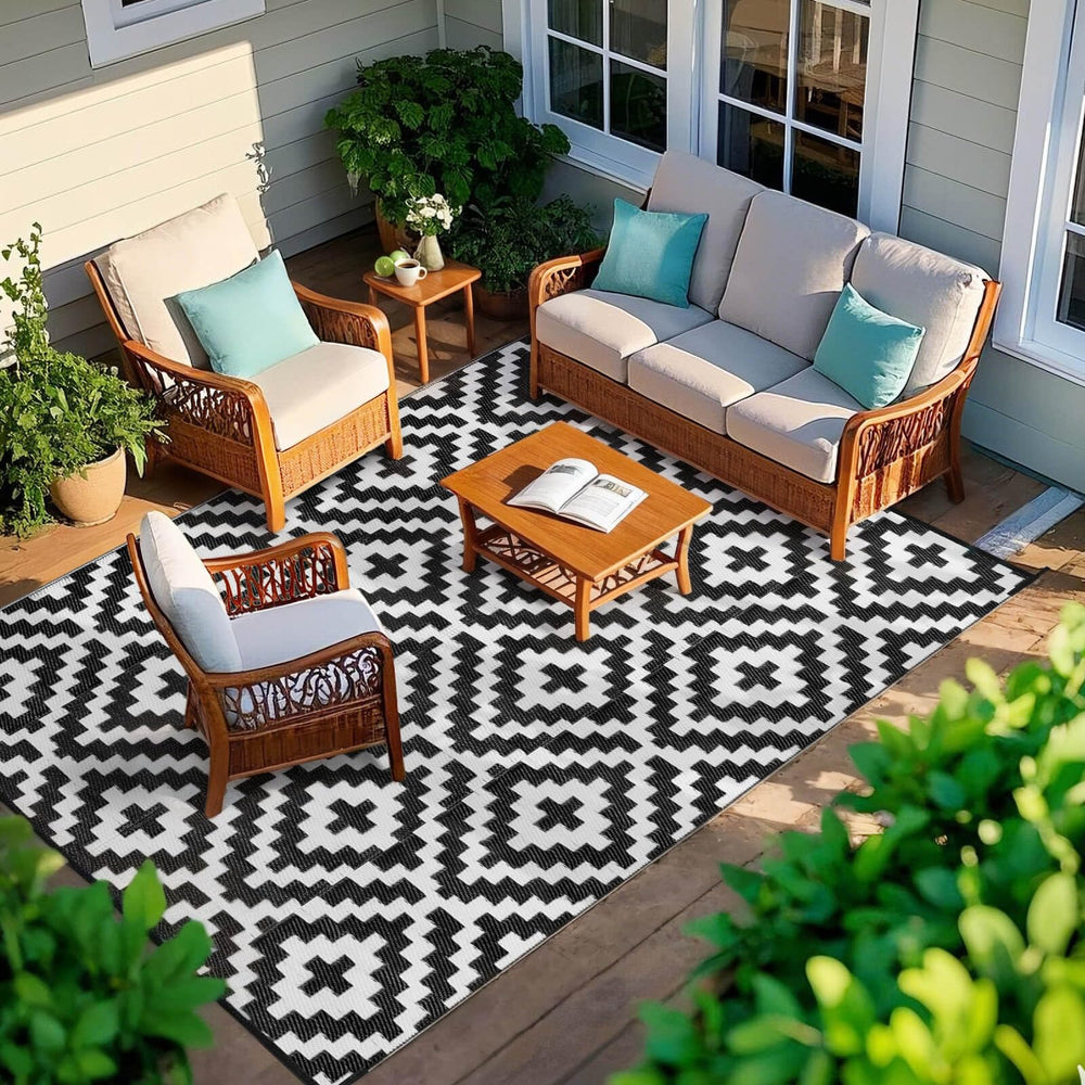 Kalafun Outdoor Patio Rug laid flat on grass
