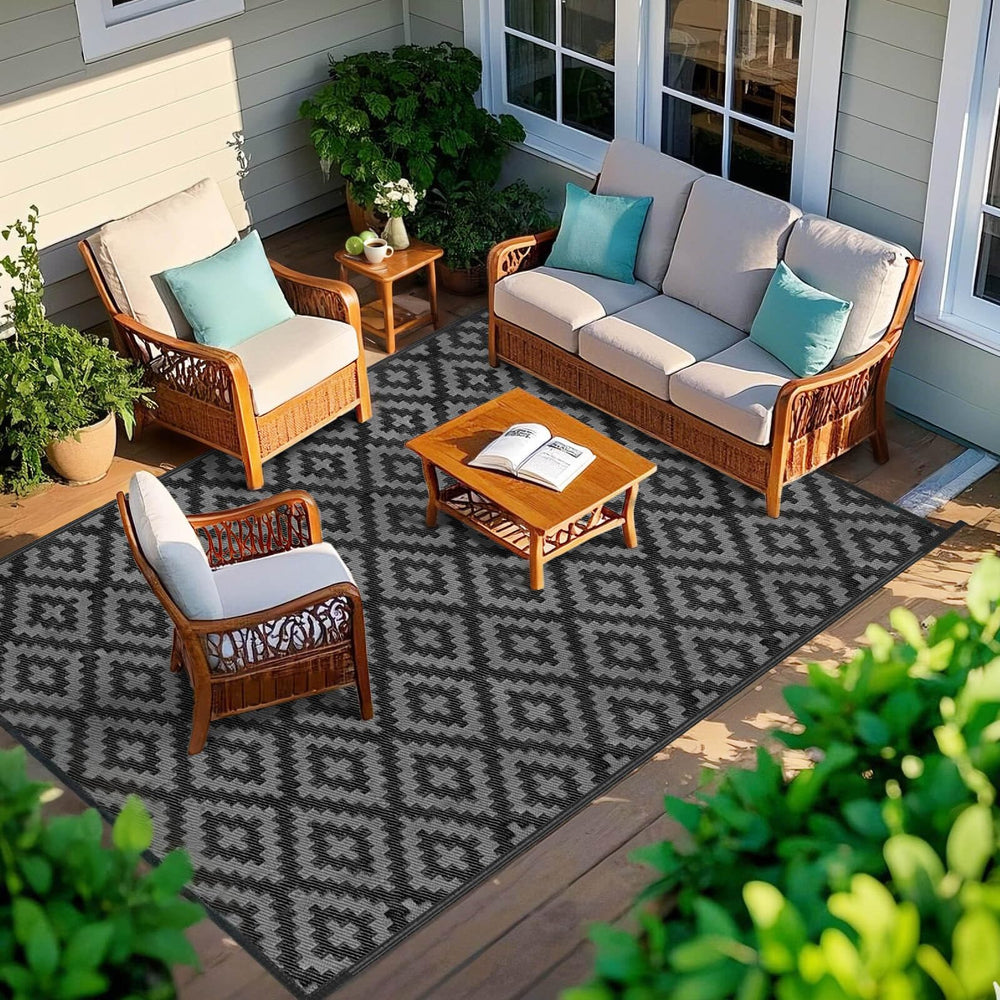 Kalafun Outdoor Patio Rug with furniture placed on it