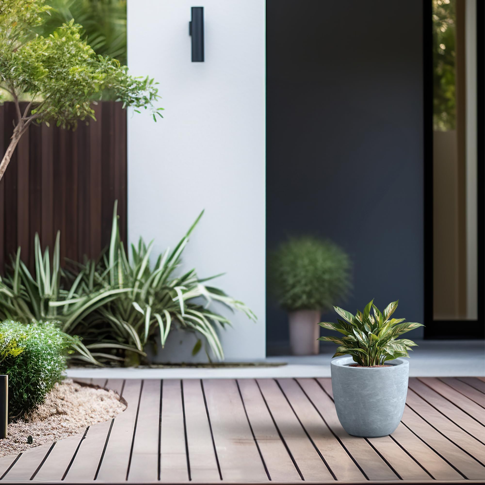 Kante Small Round Bowl Concrete Planter close-up of drainage hole