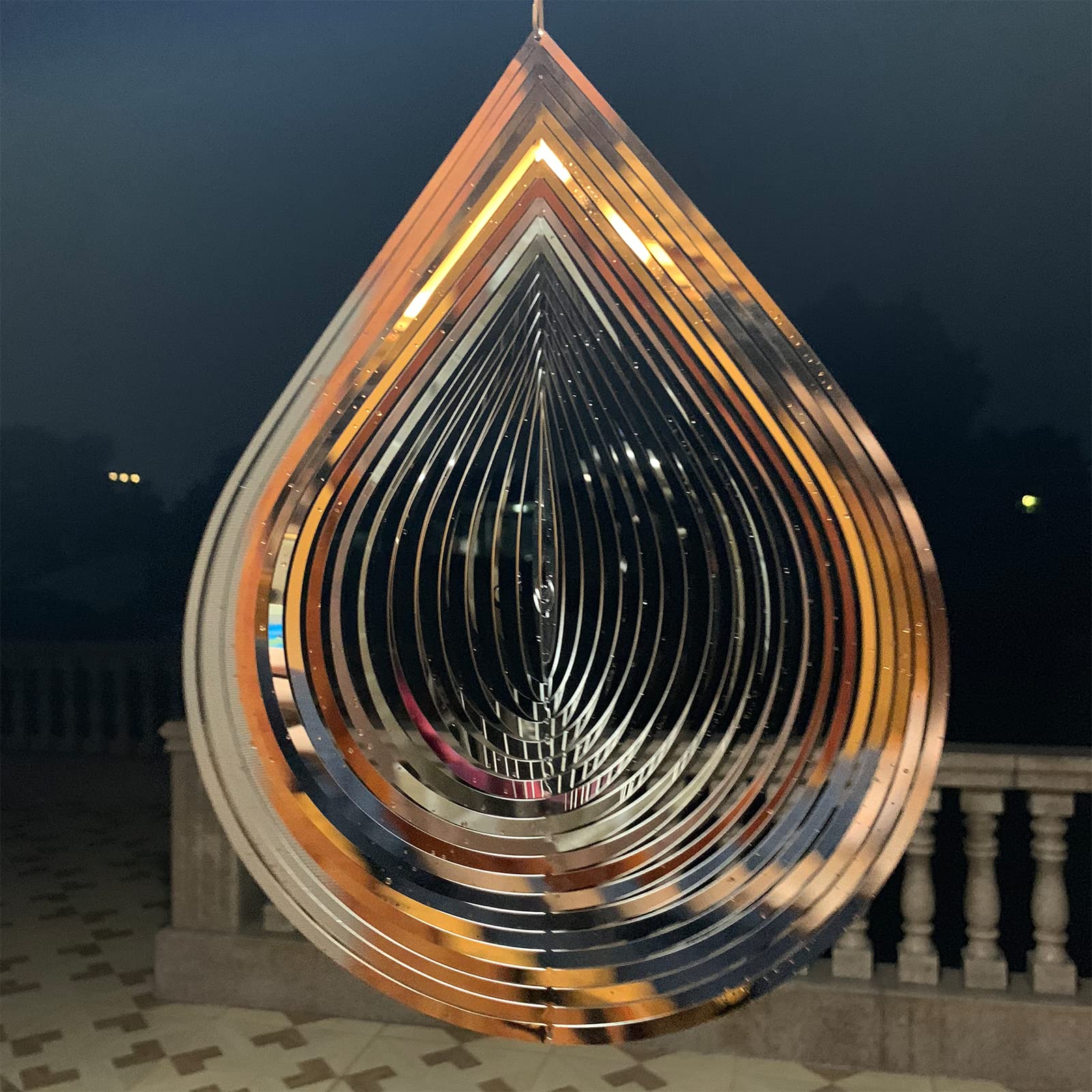Kexsscai wind spinner with sunlight reflection