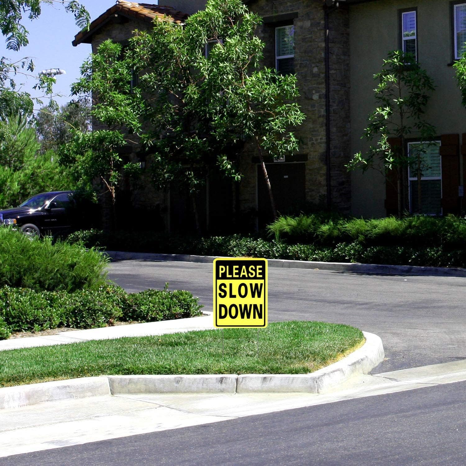 Kichwit Slow Down Yard Signs displayed in package