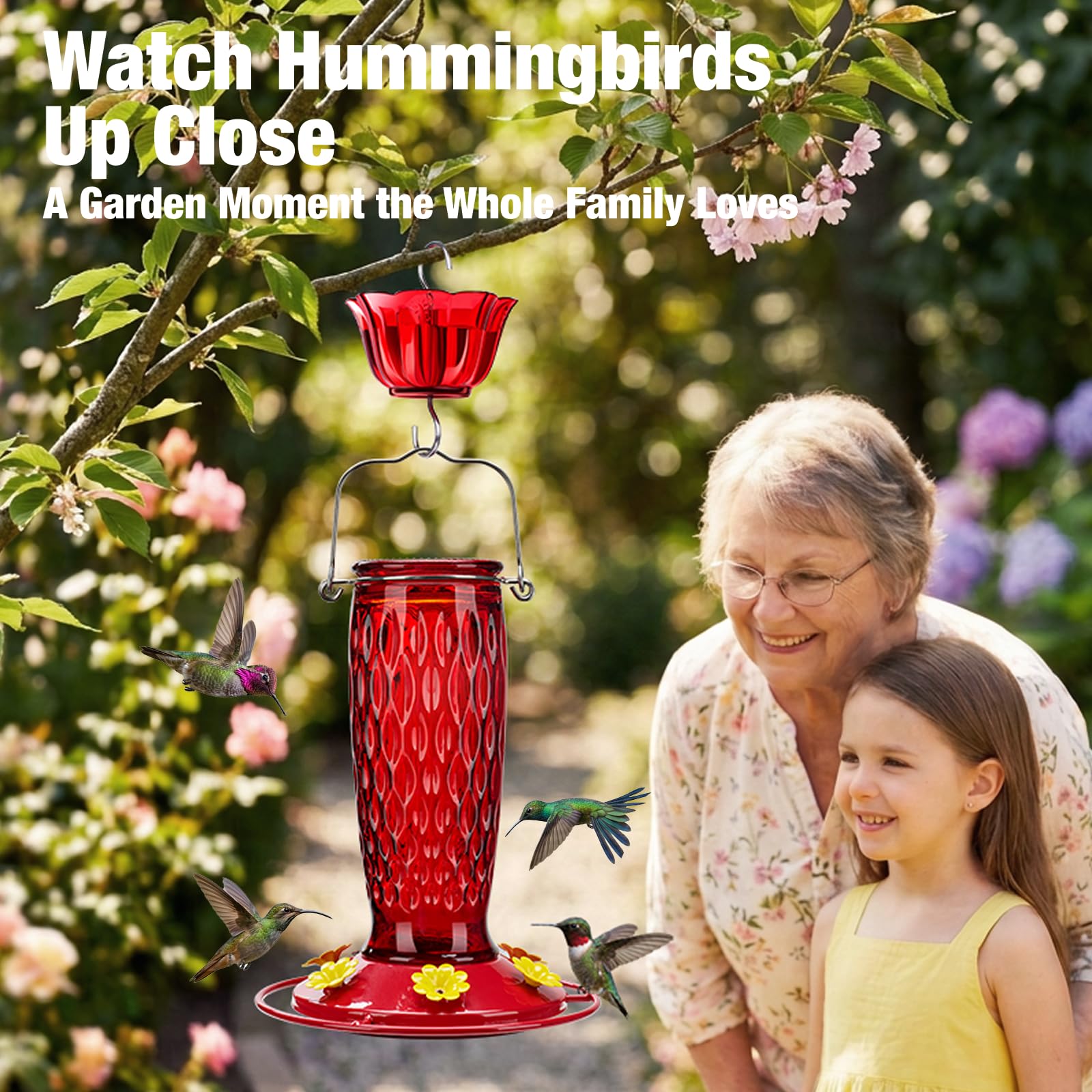 Kingsyard Glass Hummingbird Feeder displayed with flowers