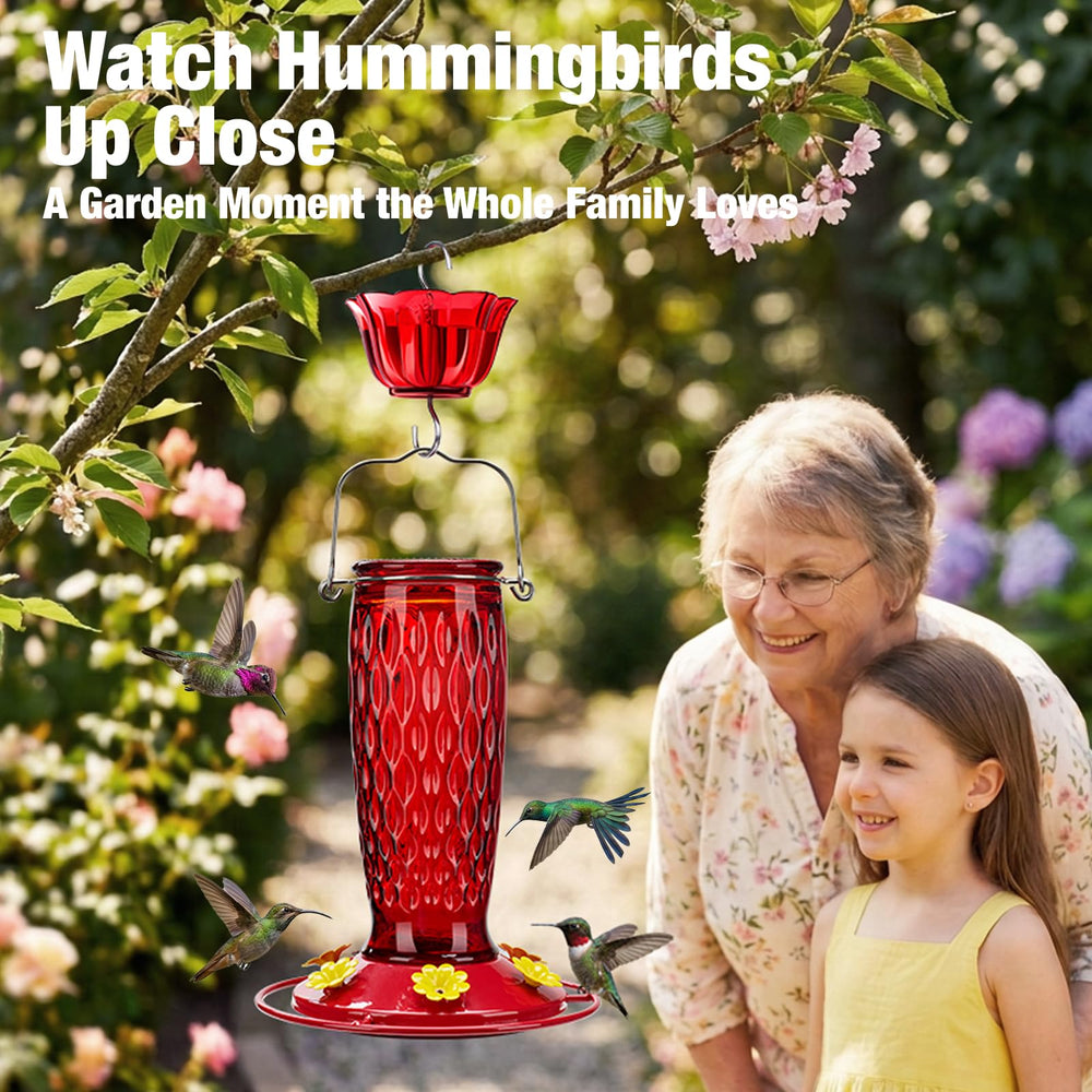 Kingsyard Glass Hummingbird Feeder displayed with flowers