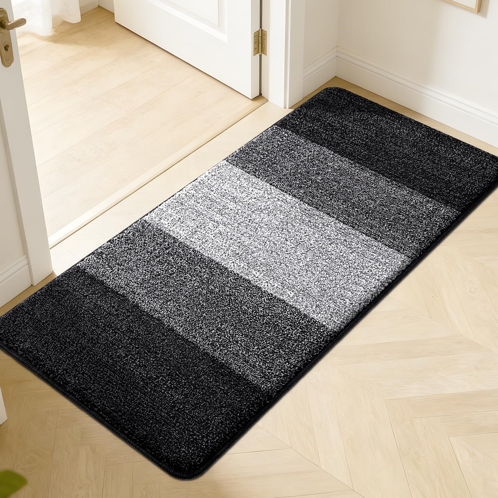 Kitinjoy Indoor Outdoor Door Mat 50x30 black front view