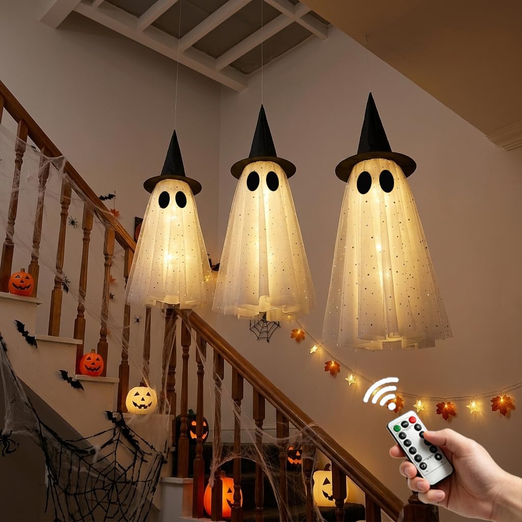 KIWDY ghost lights glowing at night in a yard