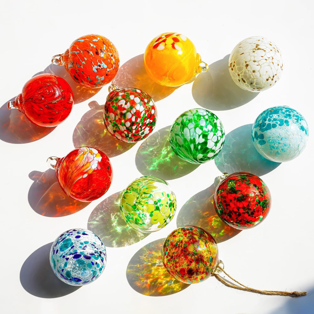 KRISININE glass gazing balls showing vibrant colours