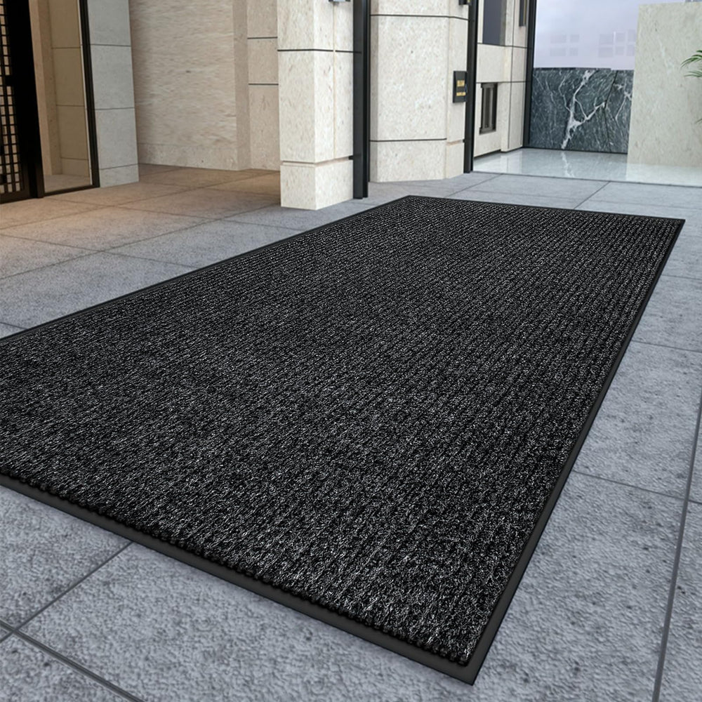 Kuyal Front Door Mat 2'x6' textured PVC backing close-up