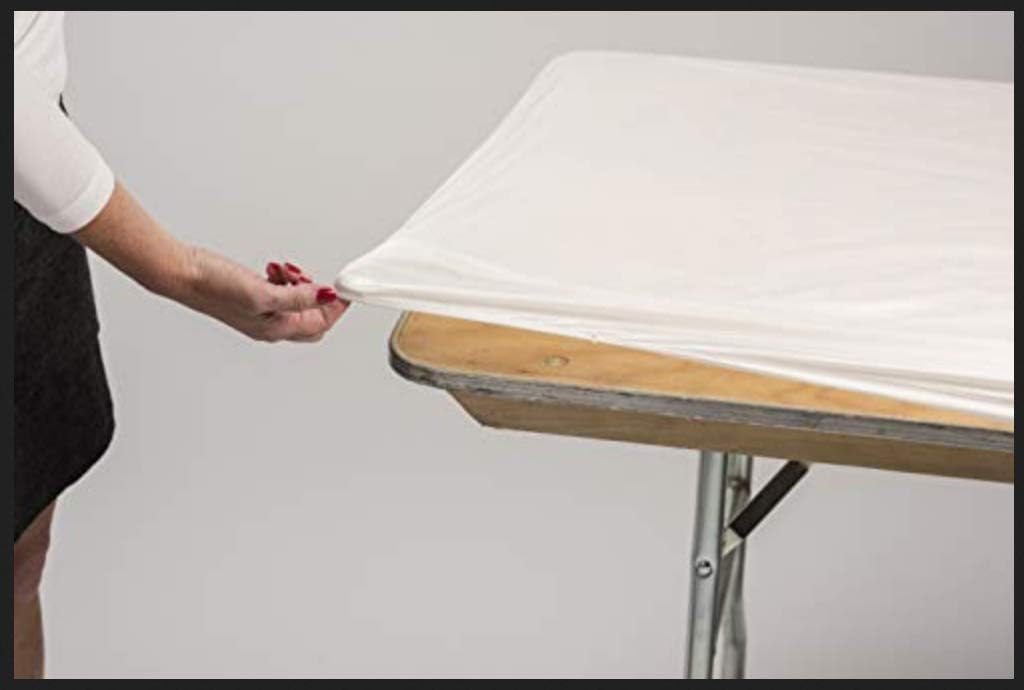 Kwik-Covers table cover in outdoor setting