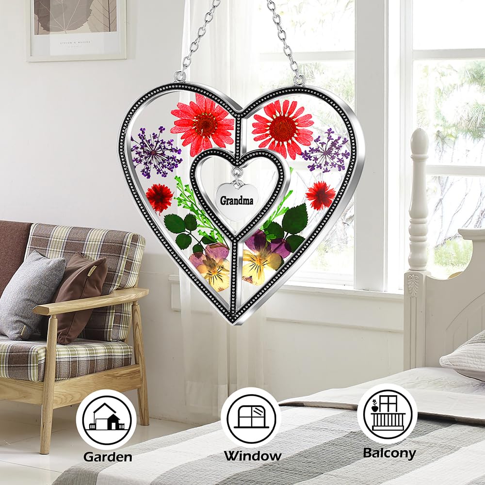 KY&BOSAM Heart Suncatcher hanging in a bright window