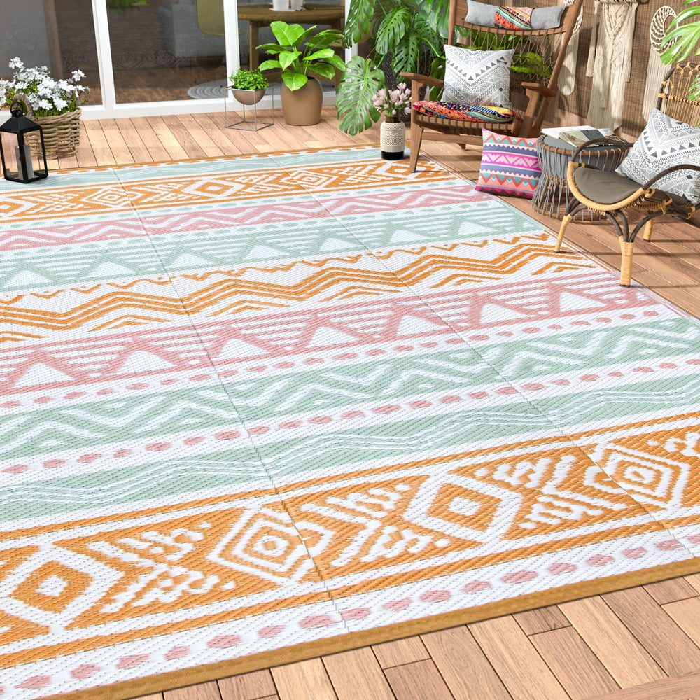 Lahome Outdoor Rug 8x10 pink and orange front view