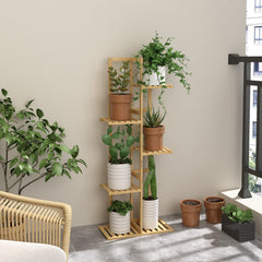Laiensia Plant Stand displayed on a balcony with potted plants