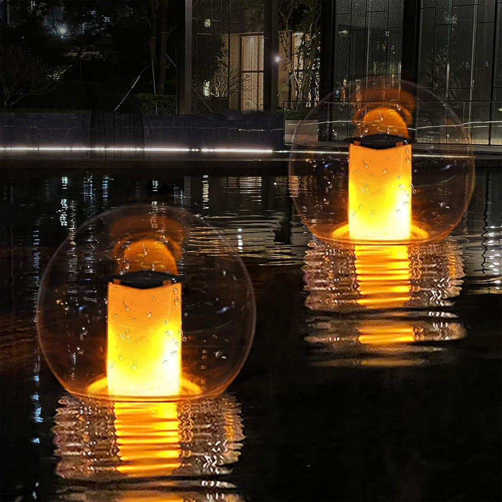 LanPool Floating Pool Lights in a garden setting