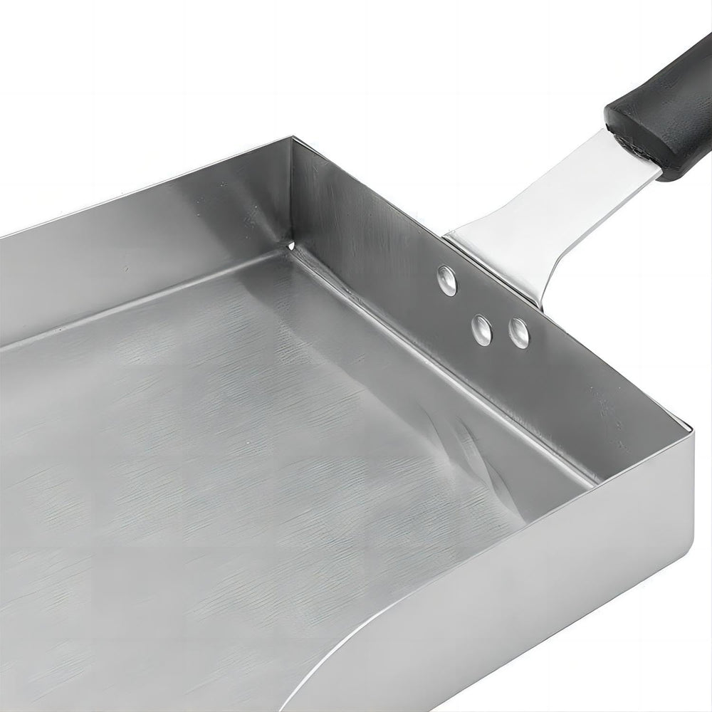 Large Griddle Scoop laid flat on a kitchen counter
