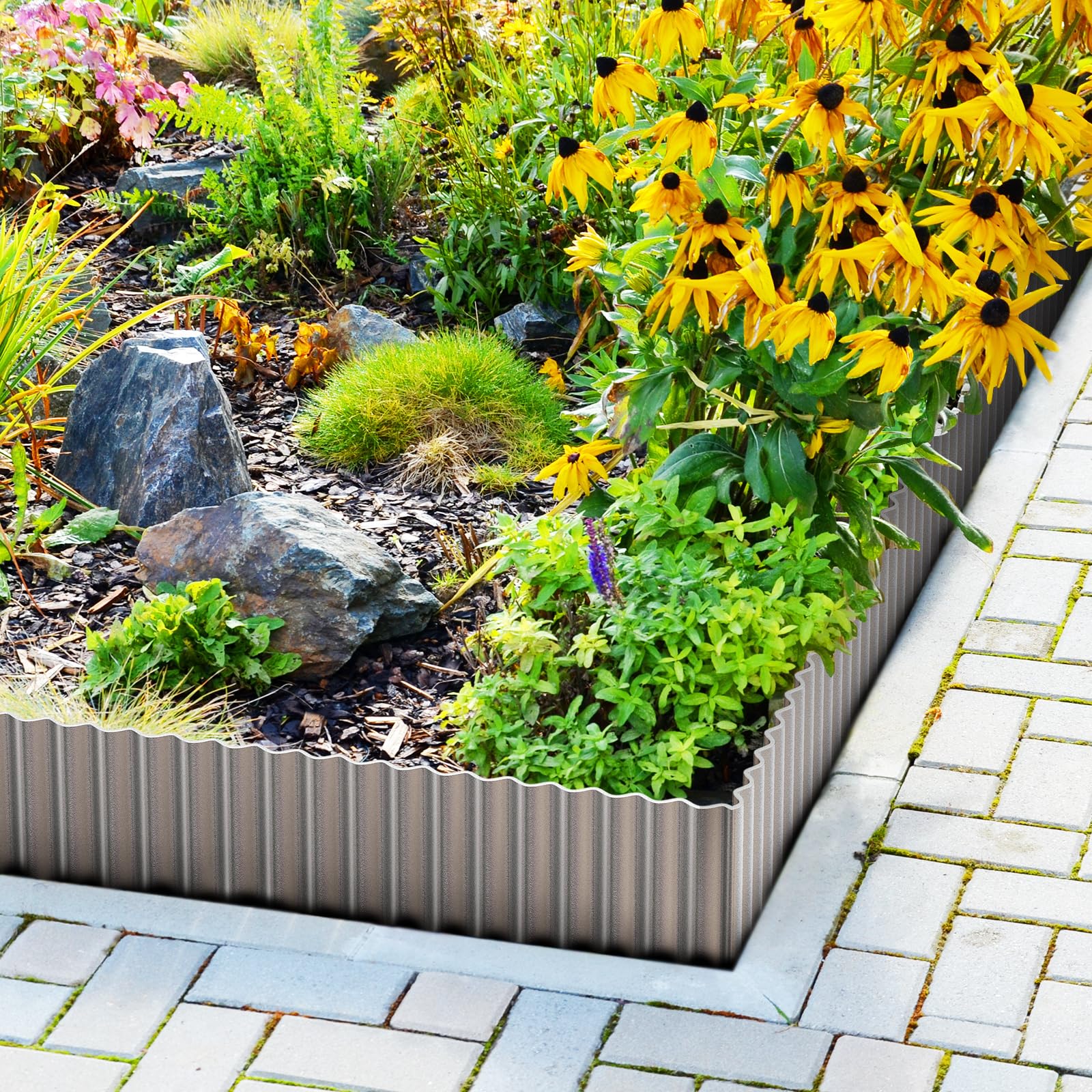 LAVEVE silver garden edging installed around flower bed