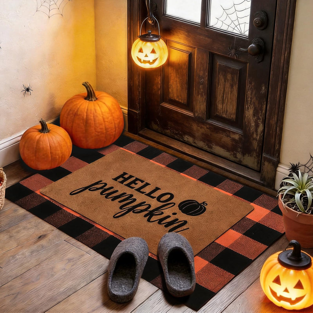 Layered view of Halloween mats at front door