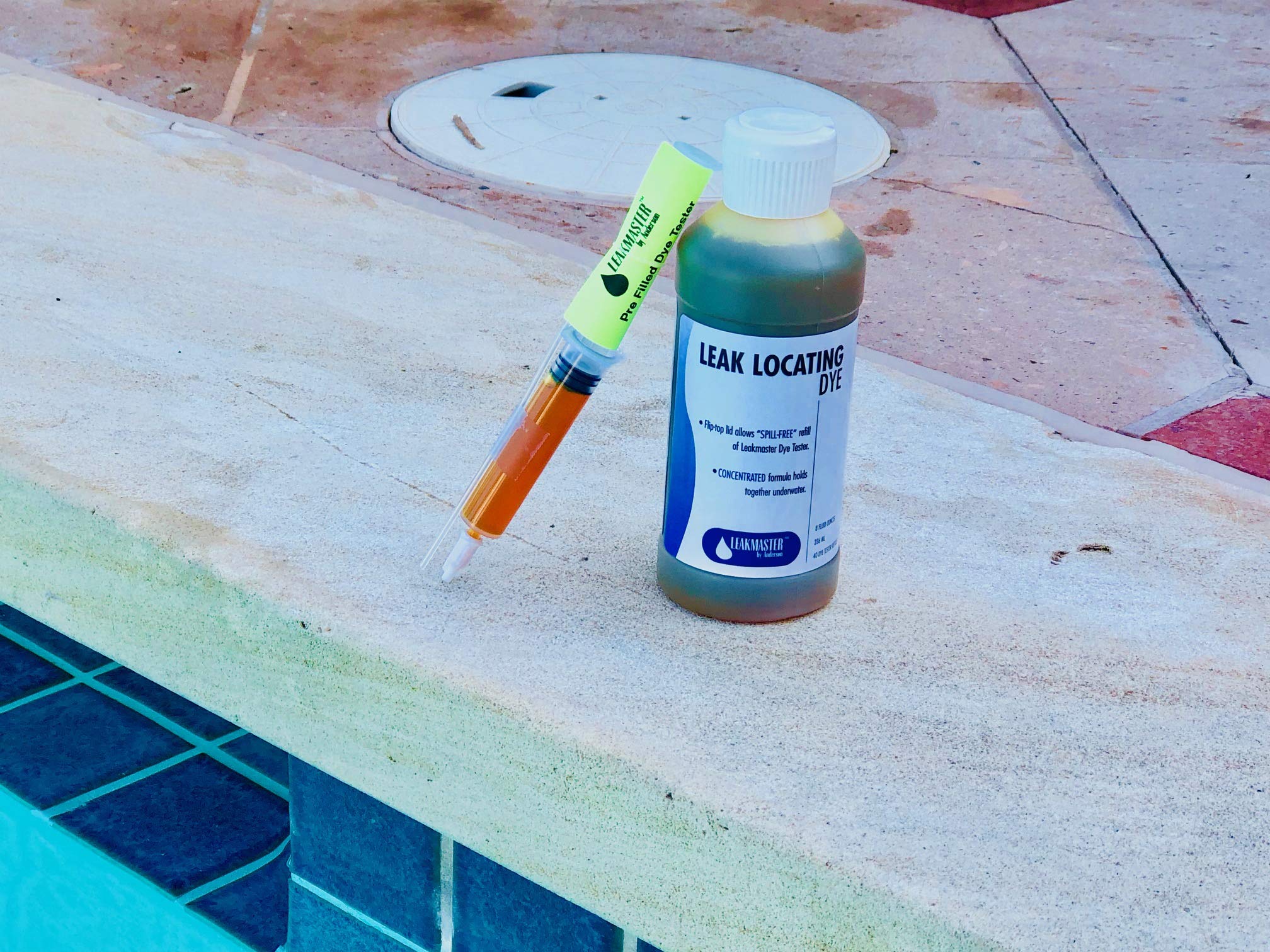 Leakmaster Pool Dye refill bottle with flip top lid