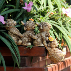 Leekung Highland Cow Figurine on a table edge indoors