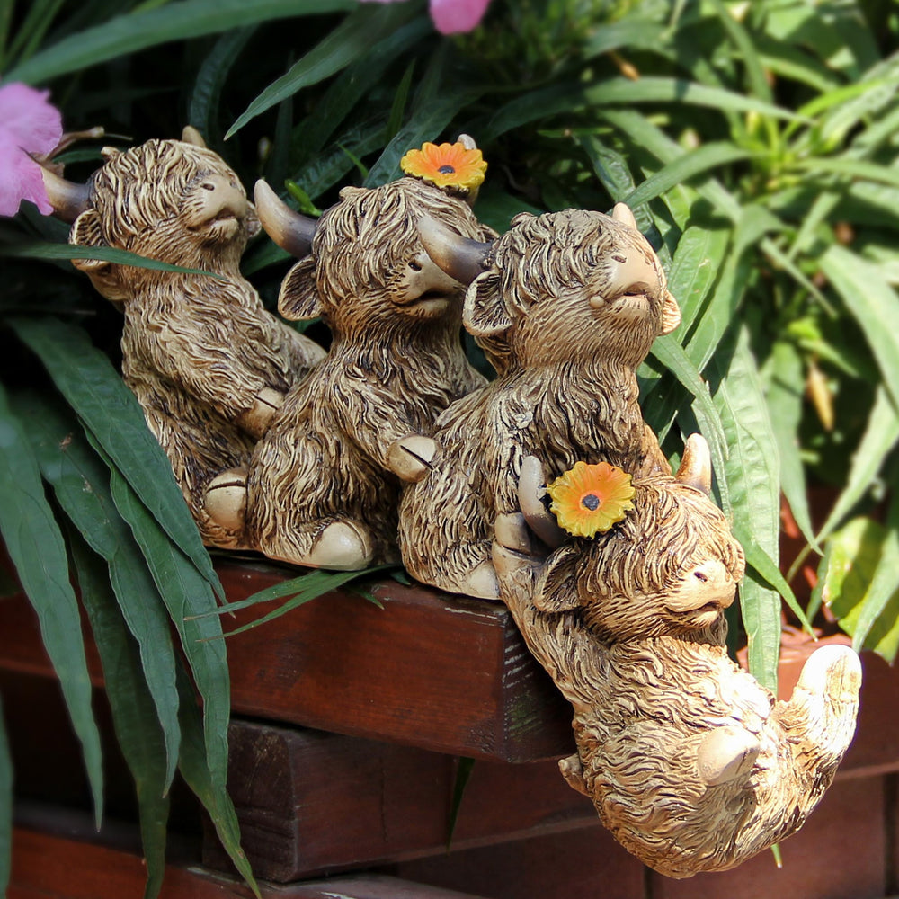 Leekung Highland Cow Figurine side view with sunflowers